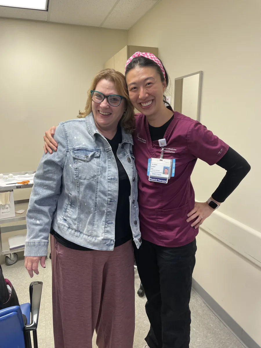 Dr. Carolyn Baek standing with a patient after lymphatic care