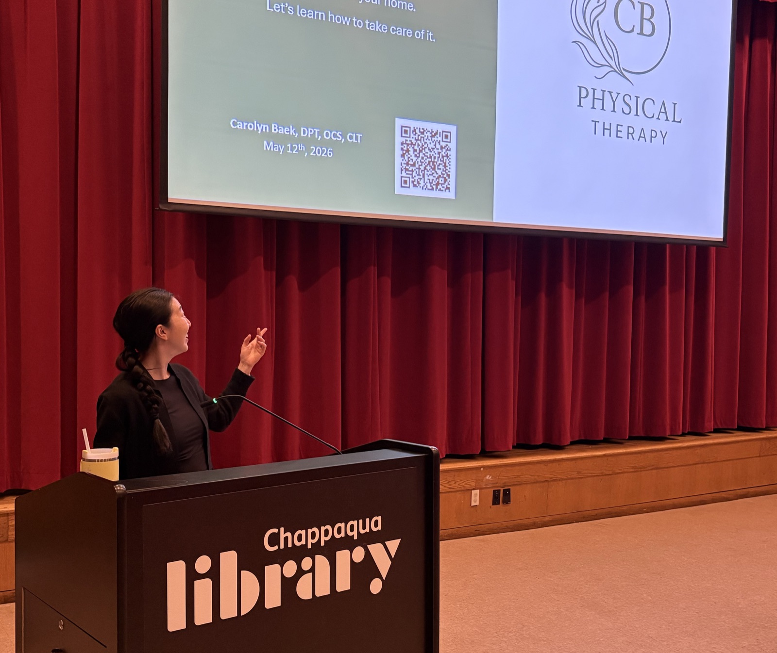 Dr. Carolyn Baek presenting a lymphatic health talk at Chappaqua Library